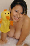 Talia and her duckie in the bath